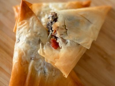 Creamy Mushroom Phyllo Triangles with Bacon Filling